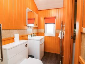 A bathroom with toilet and sink at Masons Hut in West Mains near Haggerston