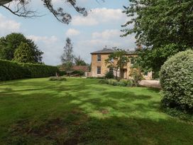 A house with garden and trees at The Old Vicarage in Merriott