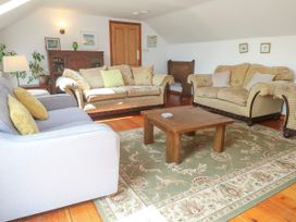 A living room with sofas and a coffee table at The Cottage in St. Ives