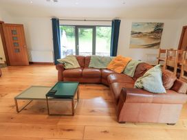 A living room with a sofa and coffee table at Bracken Ground in Coniston