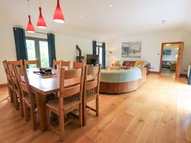 A dining room with a table and chairs at Bracken Ground in Coniston