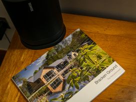 A Sonos speaker and photo album on a table at Bracken Ground in Coniston