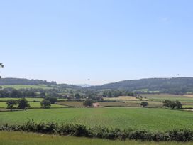 A landscape featuring fields and trees at The Fox Den in East Coker