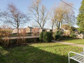 A garden with trees and a pathway at Rocklands in Shap