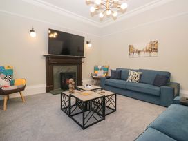 A living room with a sofa and coffee table at Rocklands in Shap