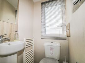 A bathroom with a sink and toilet at Tower View Number 34 Pevensey Bay