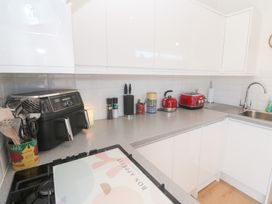 A kitchen with utensils and appliances at Carn Brea in Redruth