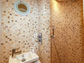 A bathroom with a shower and sink at 3 The Old Cornstore in 