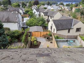 An outdoor view of houses and gardens at Stoker’s Cottage in Bowness-On-Windermere