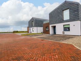 Two modern houses with a driveway at 8 Karn Havos in St. Eval near Mawgan Porth