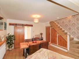 A dining room with a table and chairs at No.64 Nelson St Bridlington