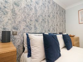 A bedroom with a bed and pillows at No.64 Nelson St in Bridlington