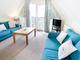 A living room with a sofa and coffee table at Valley Lodge 2 in Callington