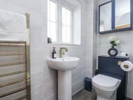 A bathroom with a sink and toilet at Pearl Stone House in Whitby