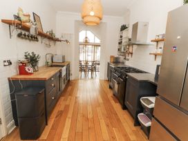 A kitchen with countertop and appliances at 43 Station Road in Keswick