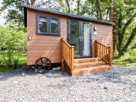 A hut with steps and windows at Shepherds Hut 2