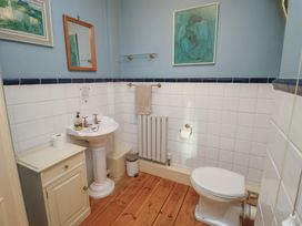 A bathroom with a sink and toilet at The Anchorage in 