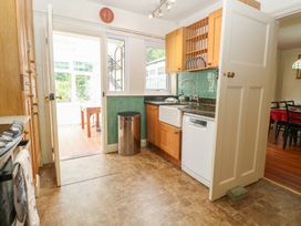 A kitchen with a sink and dishwasher at The Anchorage in Hoveton & Wroxham