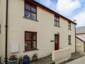 An exterior view of a house with plants at St John's House Newport, Pembrokeshire