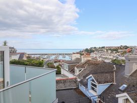 A view of the harbor and rooftops at Still Waters in Brixham