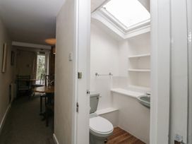 A bathroom with a toilet and sink at Penny Farthing Inn Aston Crews near Ross-On-Wye