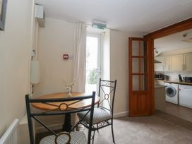 A dining area with a table and chairs at Penny Farthing Inn Aston Crews near Ross-On-Wye