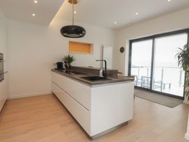 A kitchen with a sink and counter at 70 Deganwy Road in Deganwy
