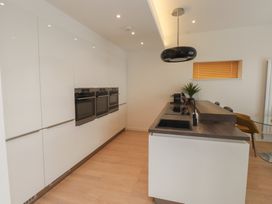 A kitchen with ovens and a cooktop at 70 Deganwy Road in Deganwy