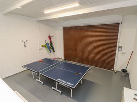 A games room with a ping pong table at 70 Deganwy Road in Deganwy