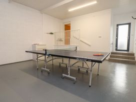 A game room with a ping pong table at 70 Deganwy Road in Deganwy