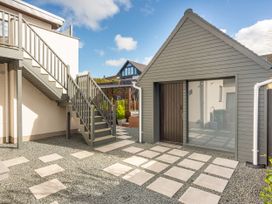 An outdoor area with stairs and a shed at 70 Deganwy Road in Deganwy