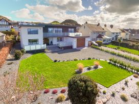 A house with a garden and garage at 70 Deganwy Road in Deganwy