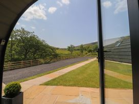 An outdoor view showing a paved pathway and grass at Barley near Nelson