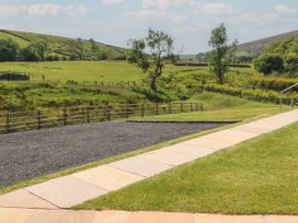 An outdoor area with a gravel space and a path at Ogden in Nelson