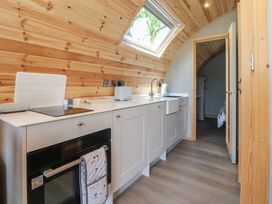 A kitchen with cabinetry and appliances at Pendle in Nelson