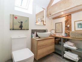 A bathroom with a toilet and sink at The Art House in Leominster