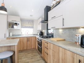 A kitchen with appliances and countertop at No. 2 - Seaview in Kessingland