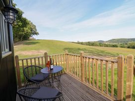 An outdoor area with a table and chairs at Cheviot in Oswestry