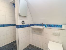 A bathroom with a sink and toilet at Silver Copse Frilford Heath Near Abingdon
