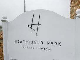 A sign for Heathfield Park luxury lodges at Pinewood in Kidlington