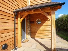 An exterior entrance with wooden features at Dingle in Cleobury Mortimer