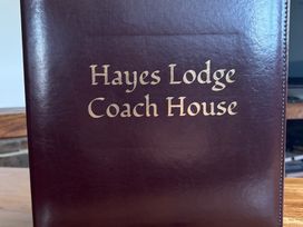 A binder with Hayes Lodge Coach House on the cover at Hayes Lodge Coach House in Chulmleigh