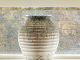 A vase with a textured surface at Apartment 1, 86 Dyer Street, Cirencester
