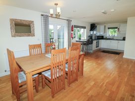A dining room with a table and chairs at Lodge 7 in Brigg