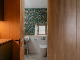 A bathroom with toilet and sink at Lower Walreddon Farm in Tavistock