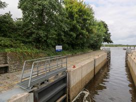 A lock with gates and surrounding trees at The Cottage in Ballinagleira