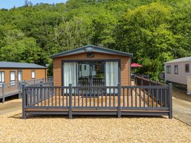 A holiday home with decking and sliding doors at The Beaumont No 34 in New Quay