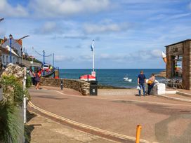 A seaside view with a café and pier at Seacroft in Combe Martin
