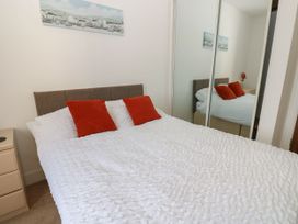 A bedroom with a bed and pillows at Seaview in Whitehaven