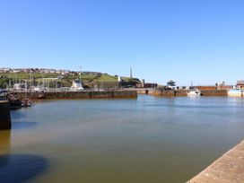 A harbor with boats and buildings at Seaview in Whitehaven